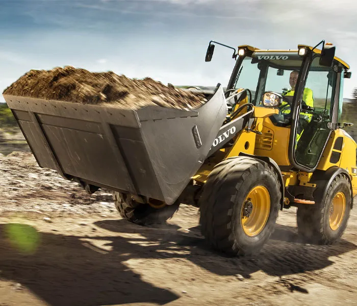 Încărcător frontal Volvo L20H lângă stocuri